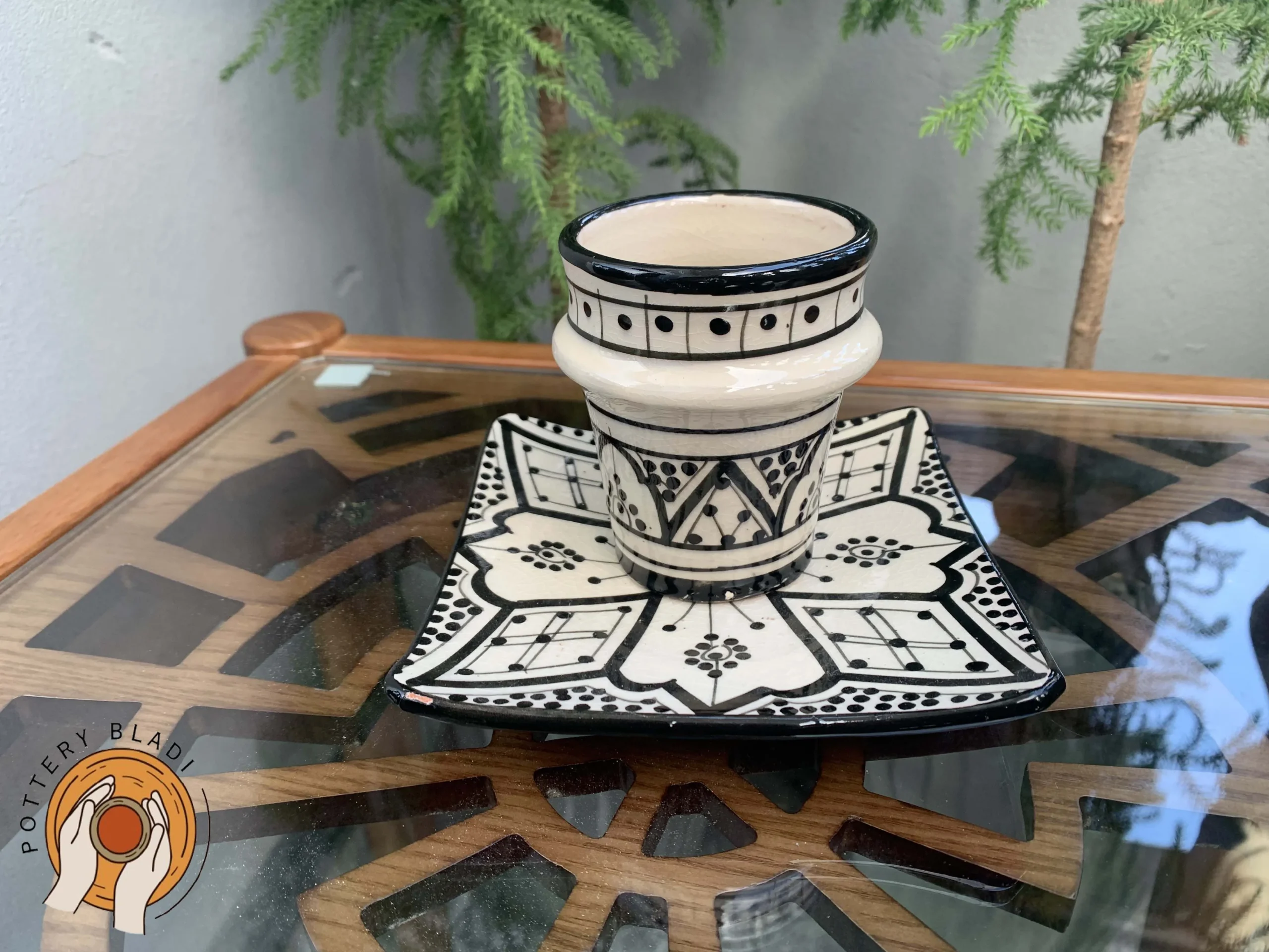 Black and white Safi pottery coffee cup with matching plate