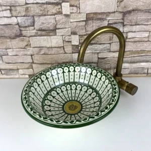 Artisan Moroccan sink with blue, green, and orange floral motifs