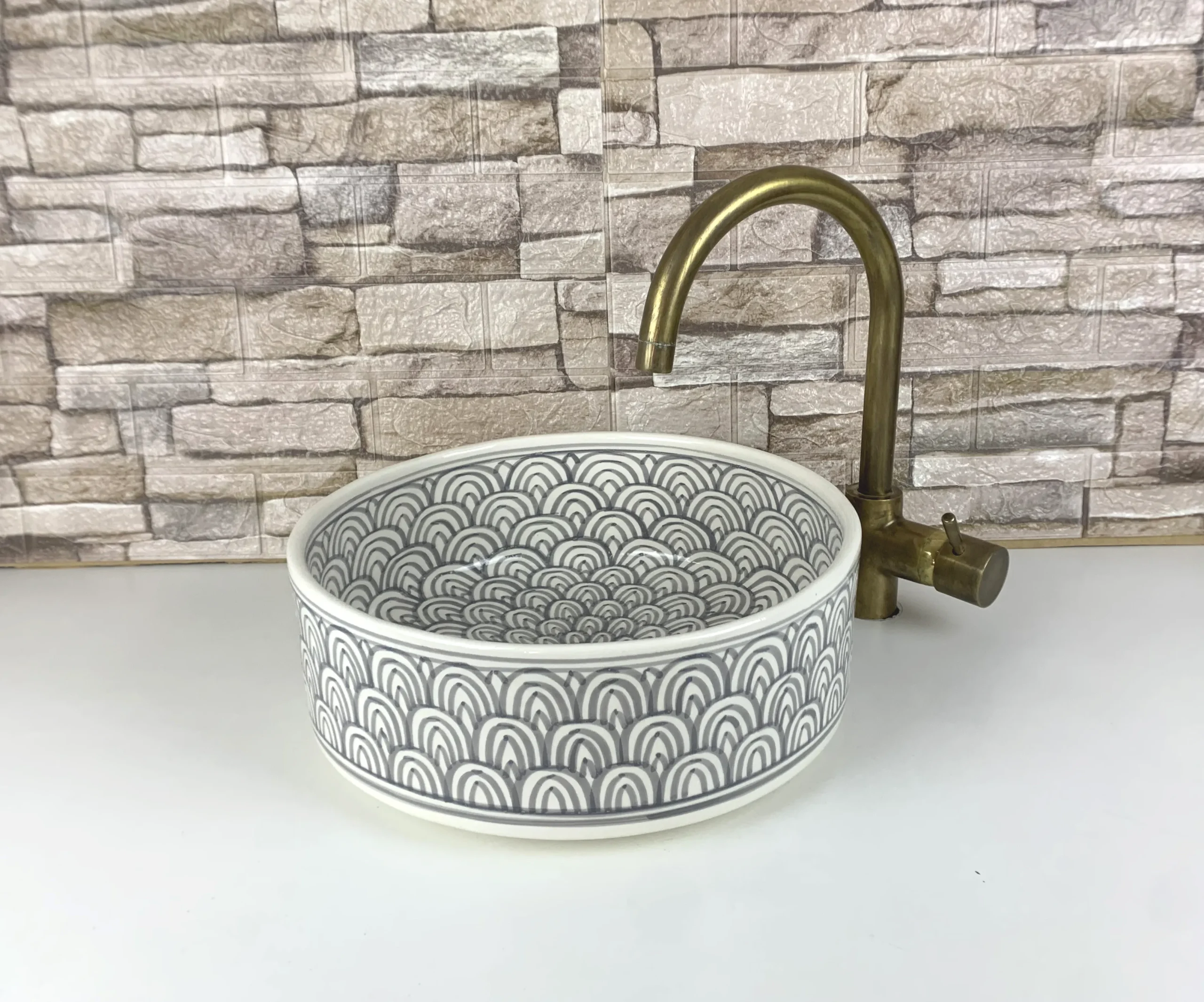 Hand-painted Moroccan bathroom sink with grey zellige-inspired design