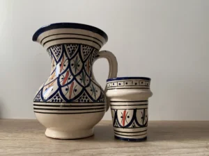 Hand-painted Safi pottery pitcher with traditional patterns