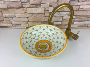 Artisan ceramic basin with geometric Moroccan design and glazed finish