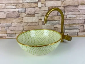 Green Moroccan ceramic vessel sink with hand-painted mandala design
