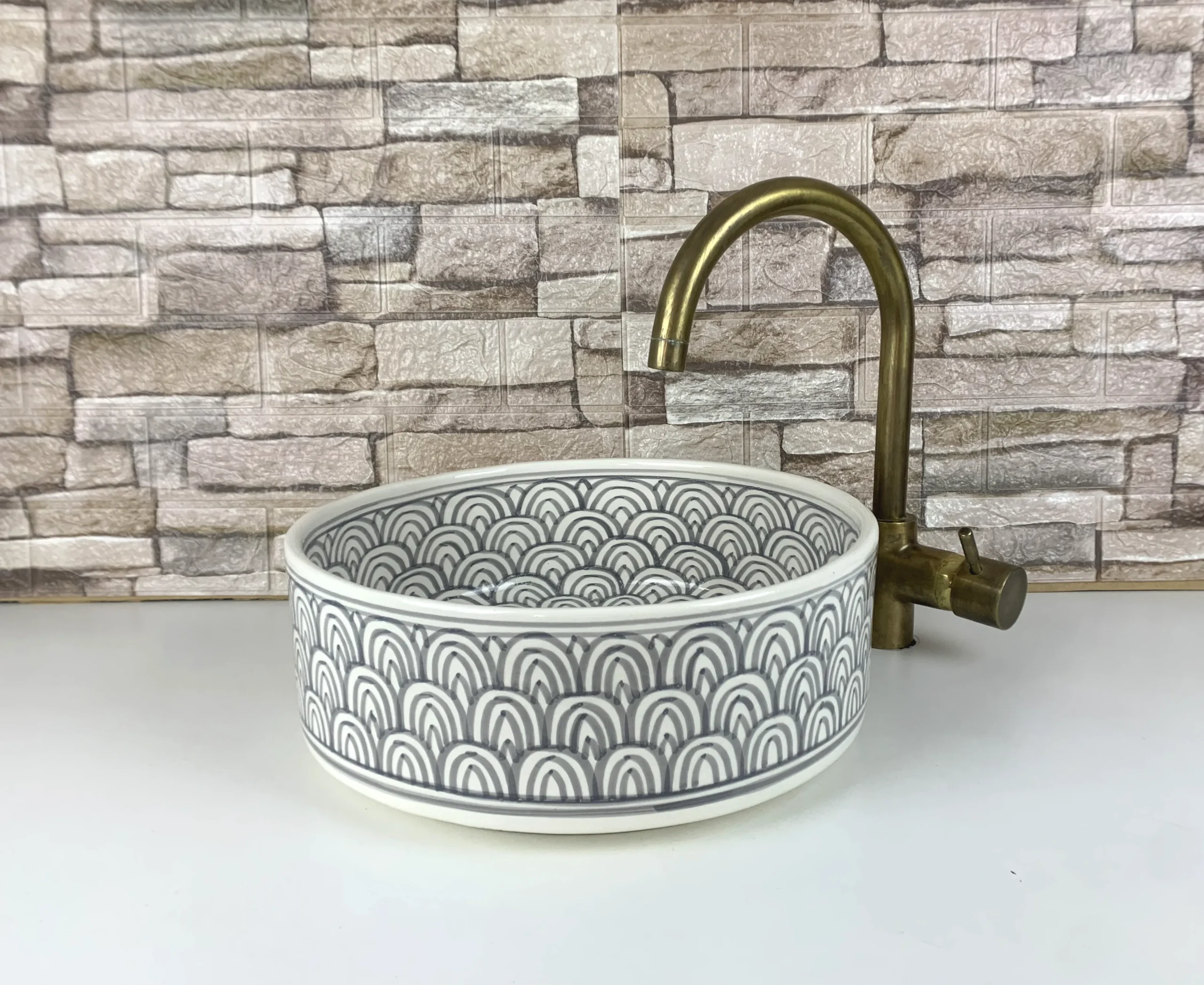 Moroccan handmade ceramic sink with grey geometric arch pattern