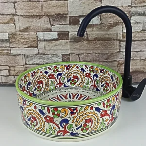 Artisan Moroccan countertop sink with traditional floral motifs