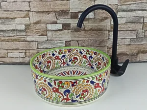 Artisan Moroccan countertop sink with traditional floral motifs