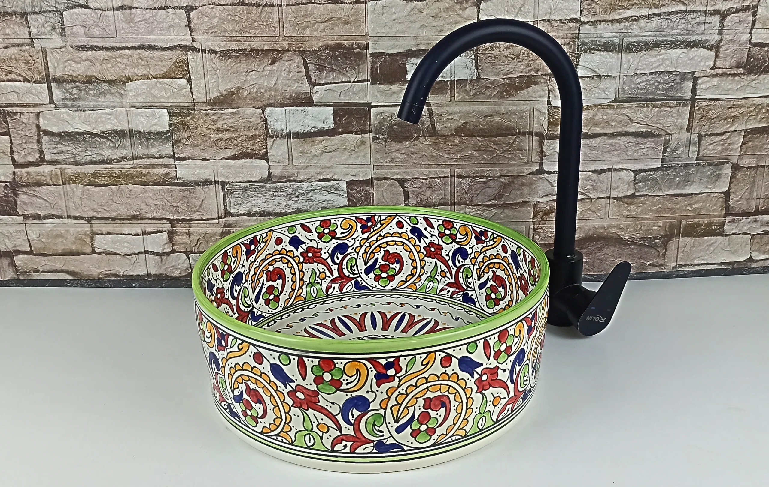 Artisan Moroccan countertop sink with traditional floral motifs