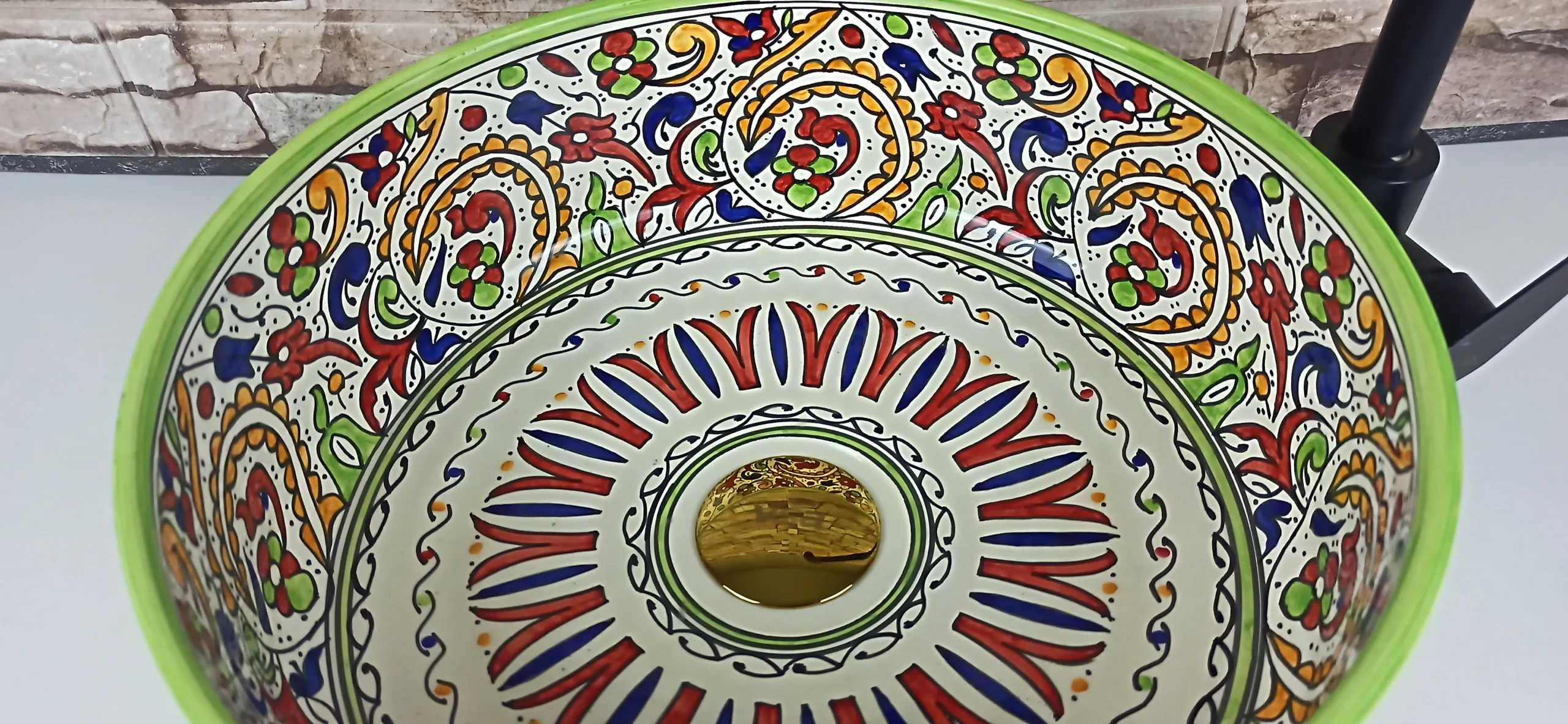 Colorful Moroccan ceramic vessel sink with floral pattern