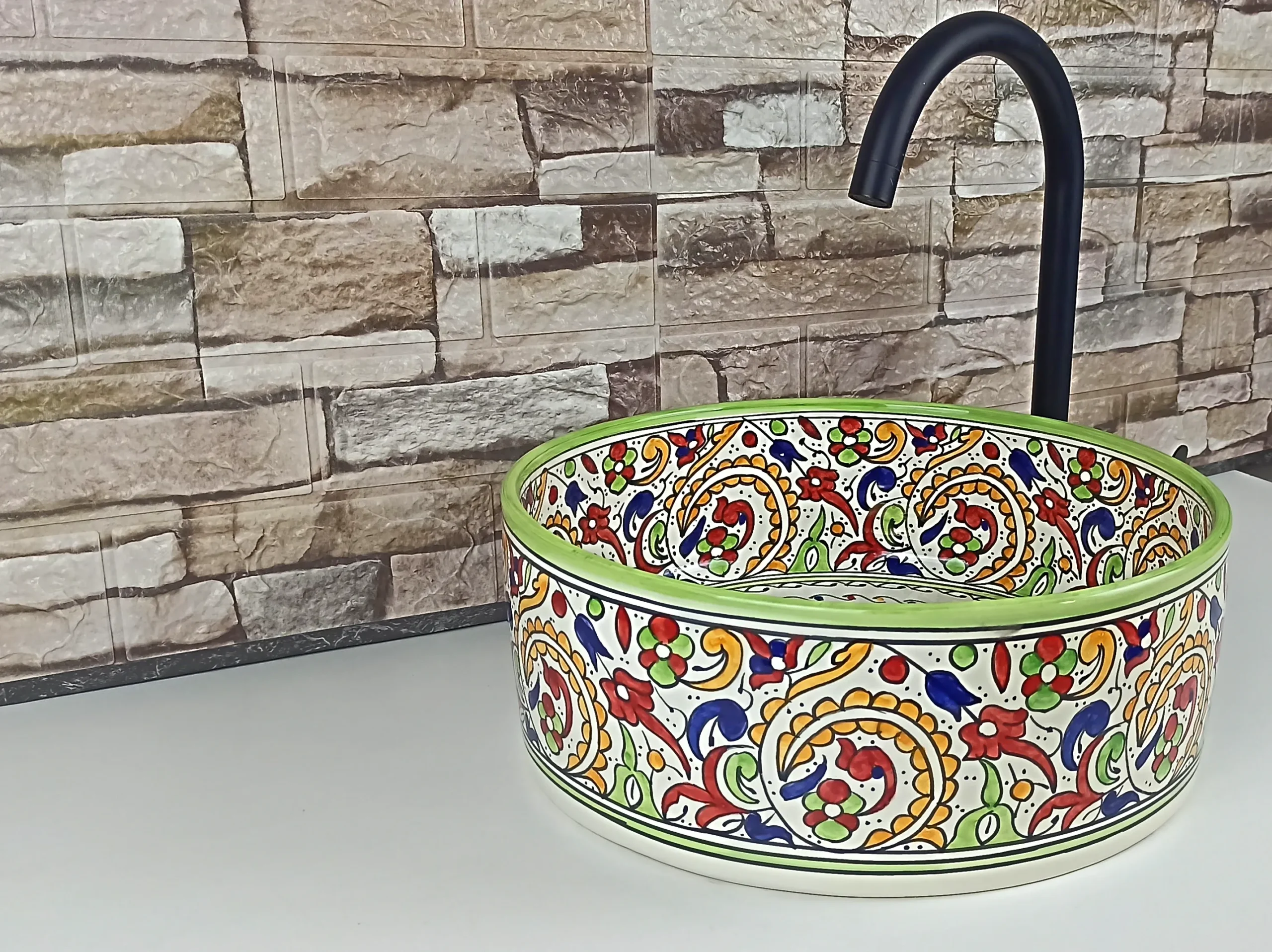 Colorful Moroccan vessel sink with glossy glazed finish