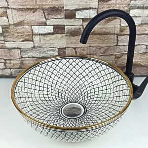 Side view Moroccan ceramic countertop sink black and white design