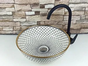 Side view Moroccan ceramic countertop sink black and white design