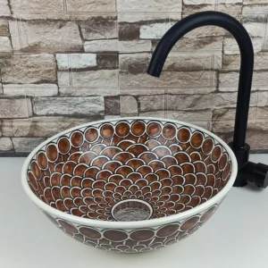 Artisan Moroccan countertop sink with scallop motif