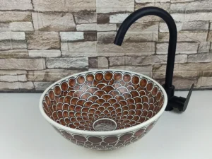 Artisan Moroccan countertop sink with scallop motif