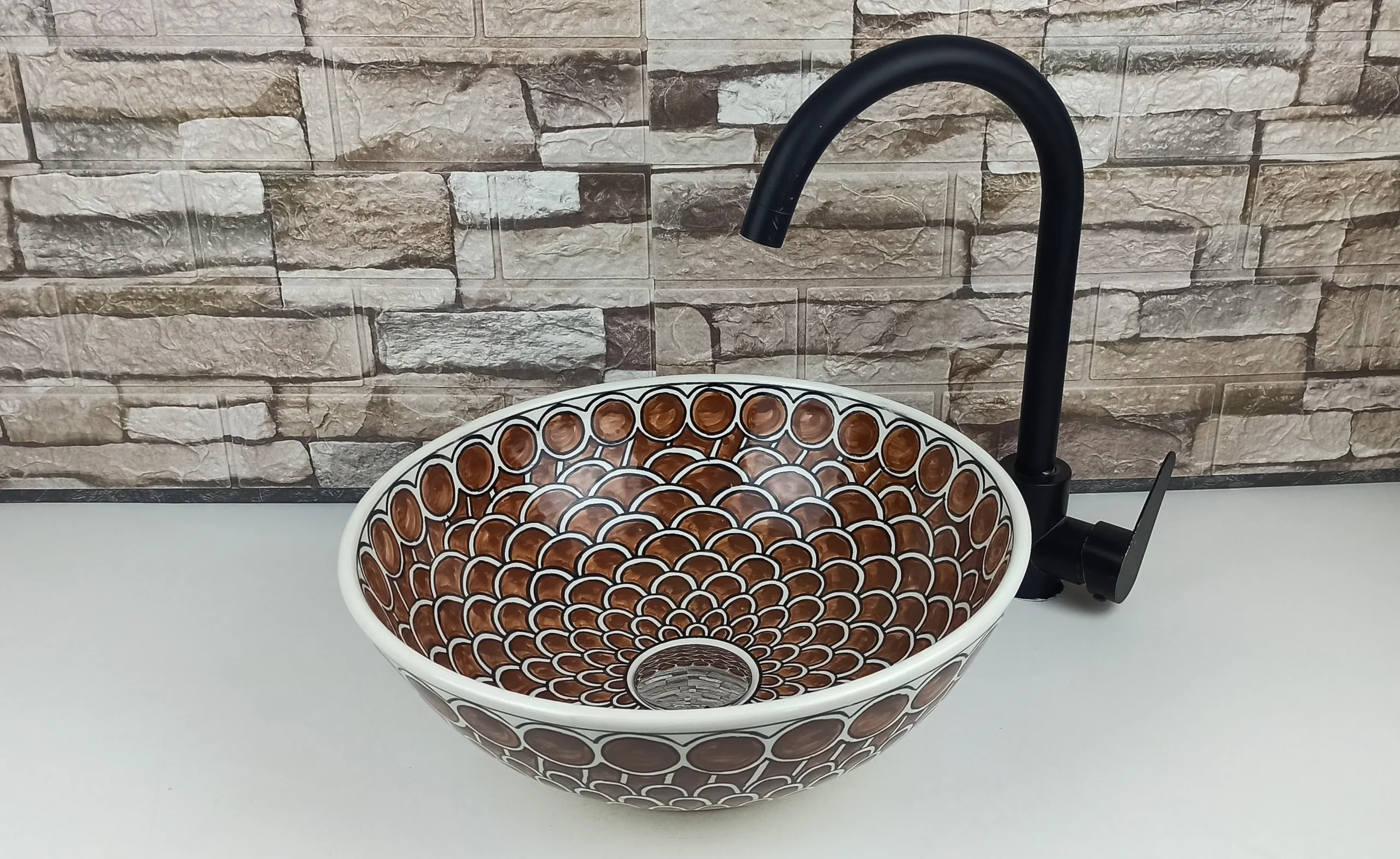 Artisan Moroccan countertop sink with scallop motif