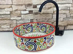 Artisan ceramic sink with traditional Moroccan floral design