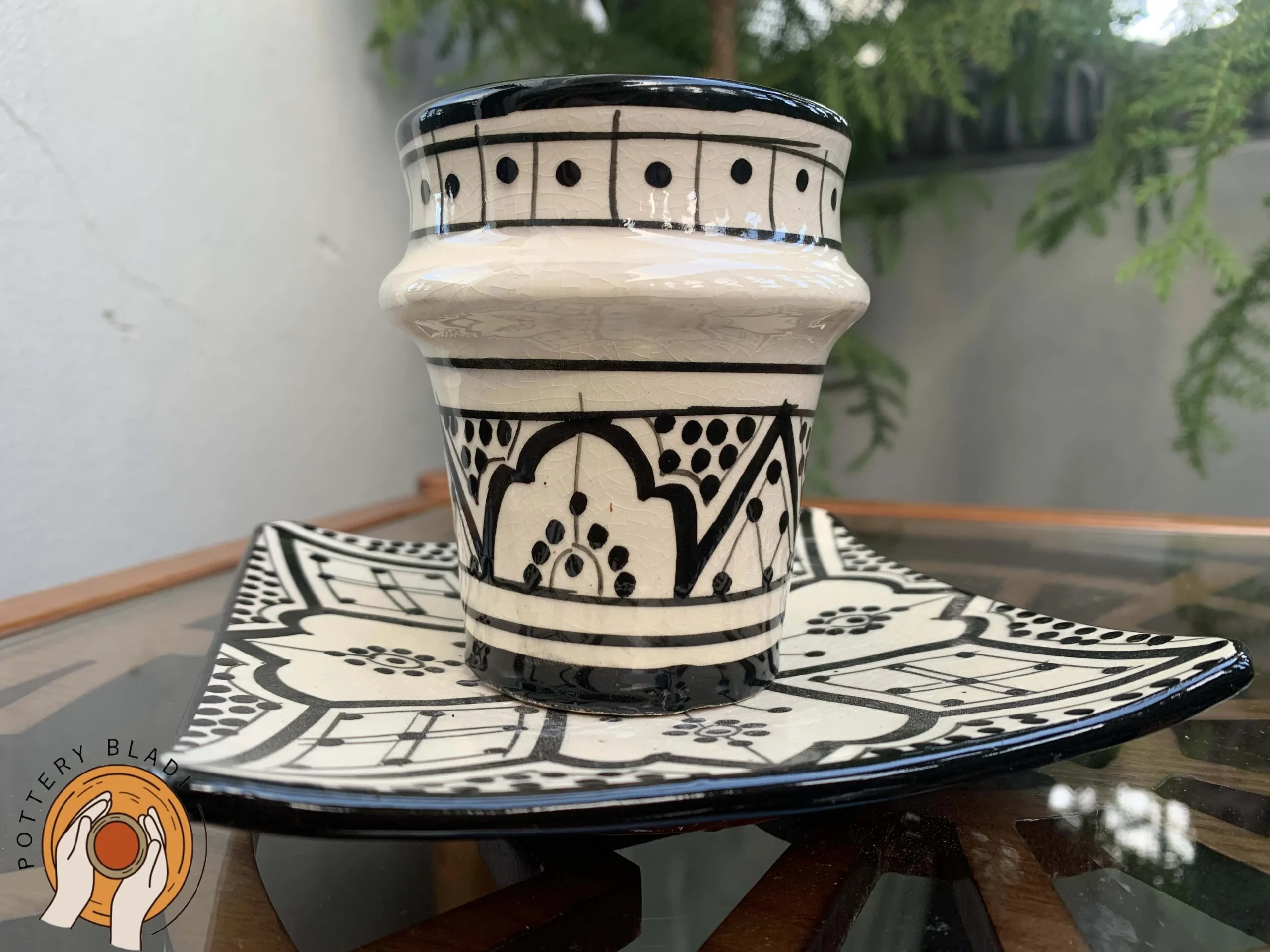 Hand-painted Moroccan ceramic cup and serving plate