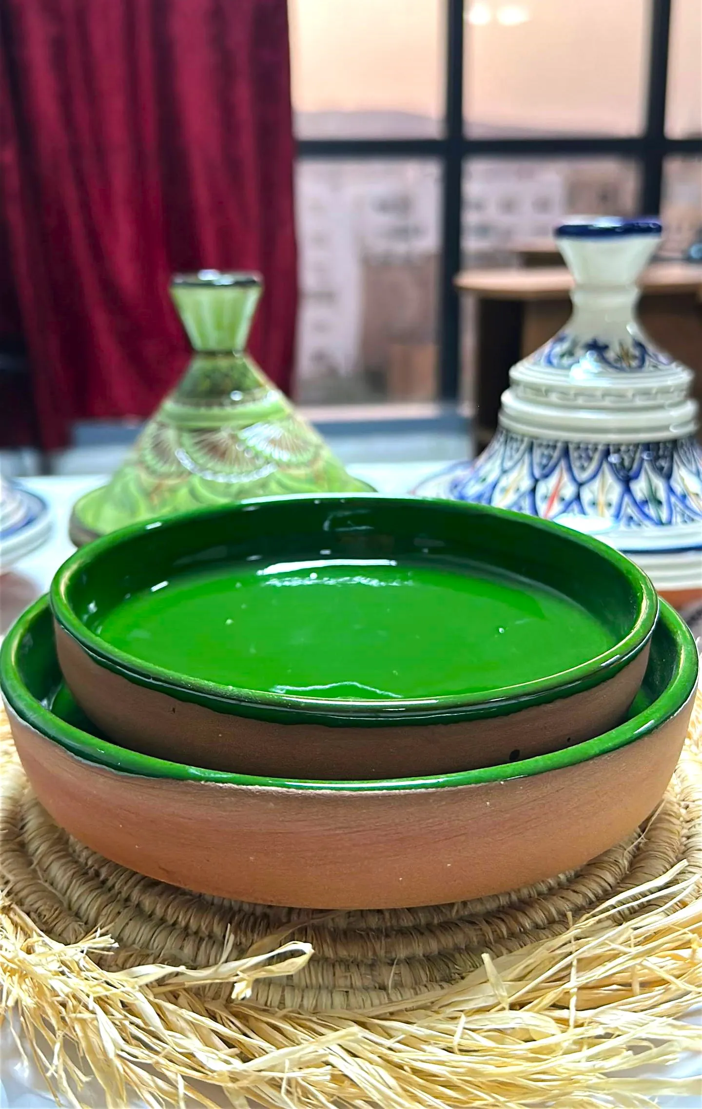Handmade Moroccan ceramic nesting plates with green glazed interior